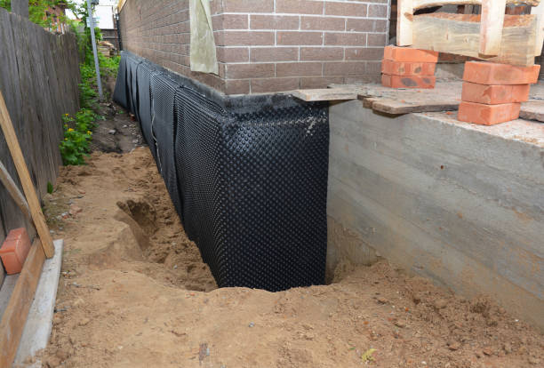 Happy homeowners after waterproofing job in Portageville